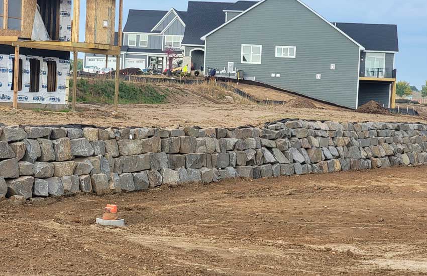 Commercial retaining wall construction by Landscapes Unlimited in Minnesota