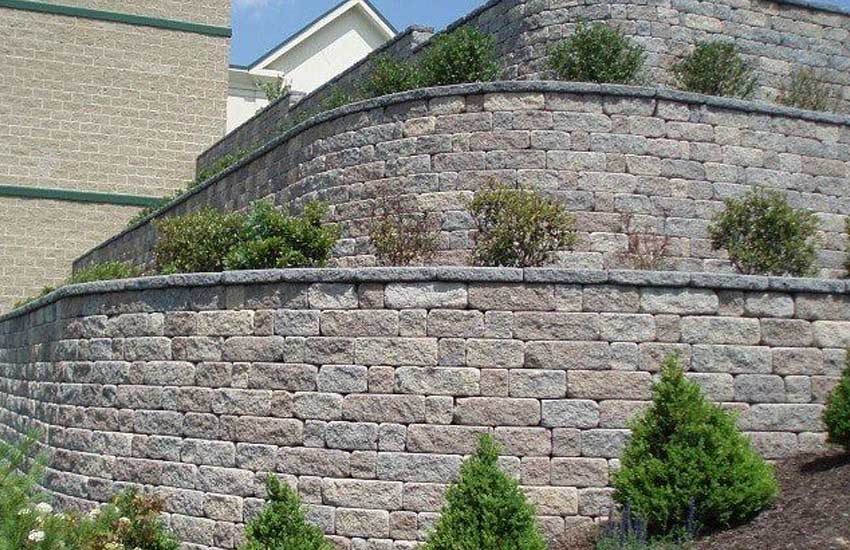 Concrete retaining wall design by Landscapes Unlimited in Minnesota