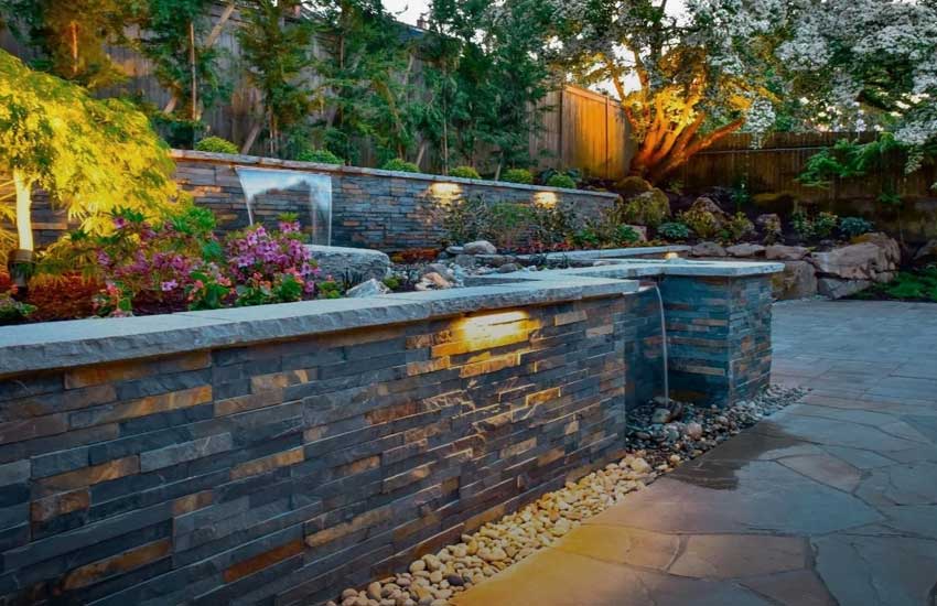 Fieldstone retaining wall installation Minnesota