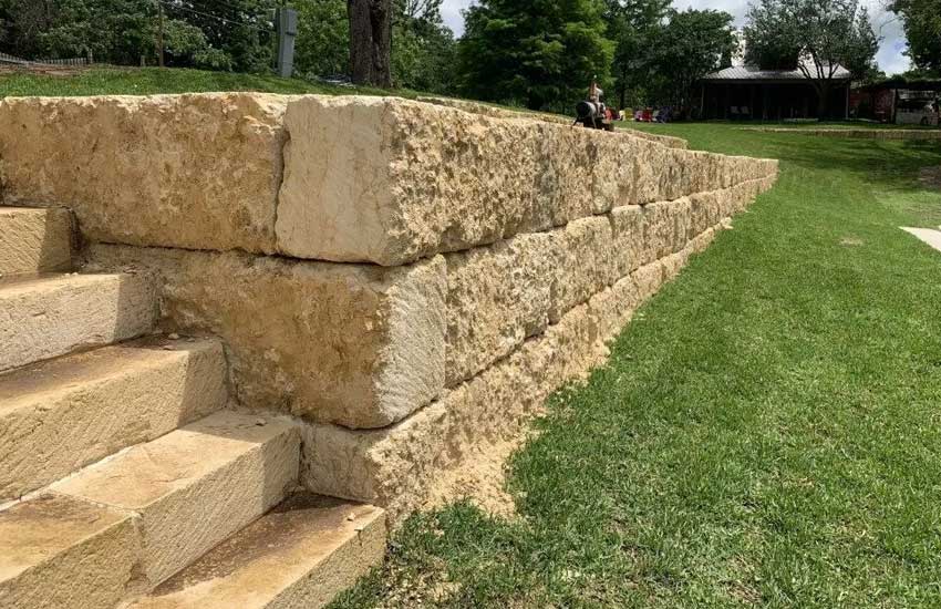 Limestone retaining wall design by Landscapes Unlimited in Minnesota