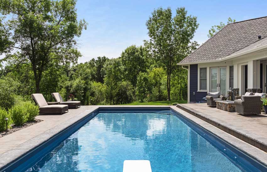 In-ground pool with paver deck