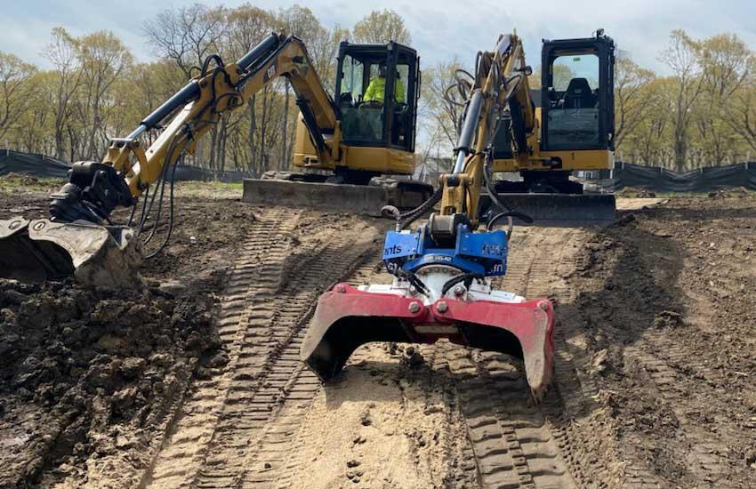 Retaining wall construction equipment on site
