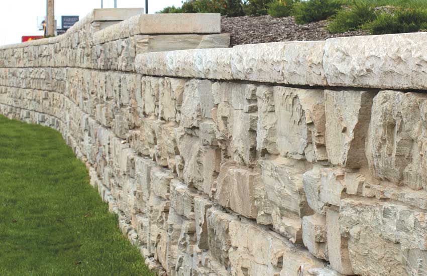 Limestone retaining wall installation Minnesota