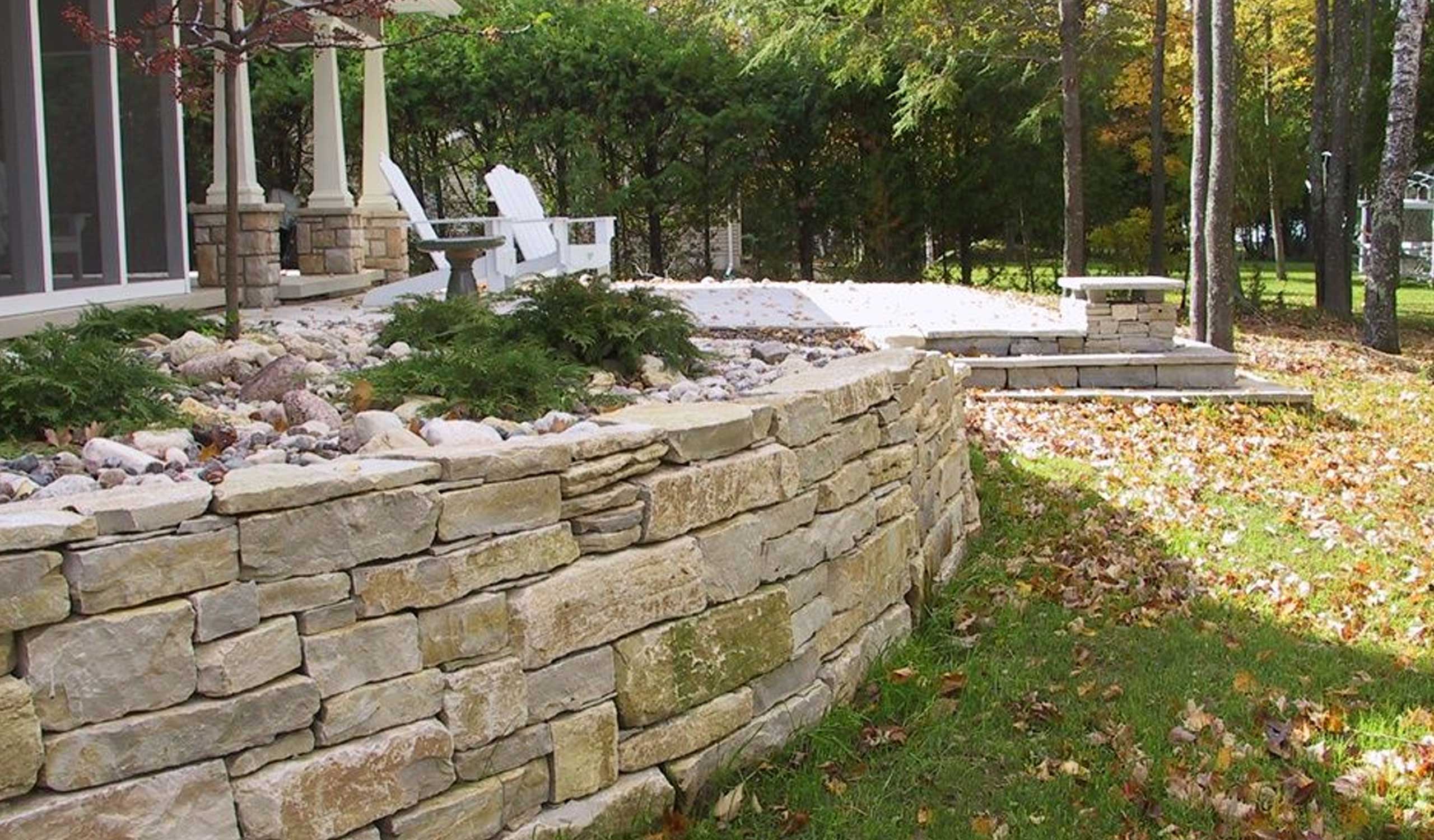 Completed limestone retaining wall by Landscapes Unlimited
