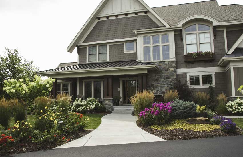 Residential home with maintained landscaping in Minnesota